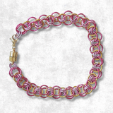 HelmWeavePinkandGoldBracelet