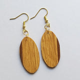oval red oak with small walnut stripe earrings