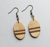 small oval red oak with basswood and walnut stripe earrings